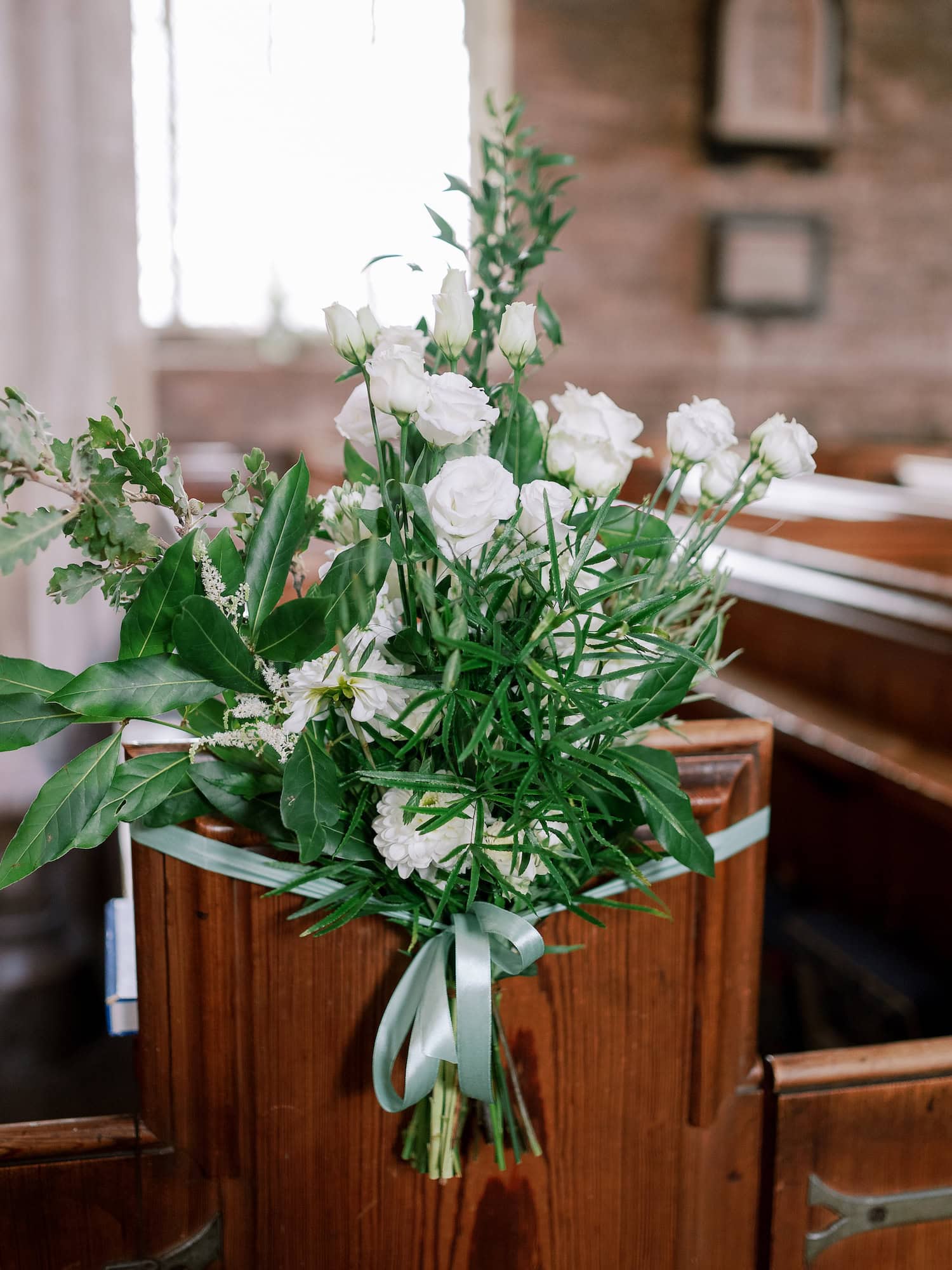 Beautiful organic pew ends for recent Luxury Wedding Flowers in the Cotswolds.